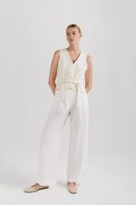 Elegant, wide, white linen trousers